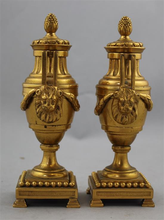 A pair of early 20th century ormolu cassolettes, 6.75in.